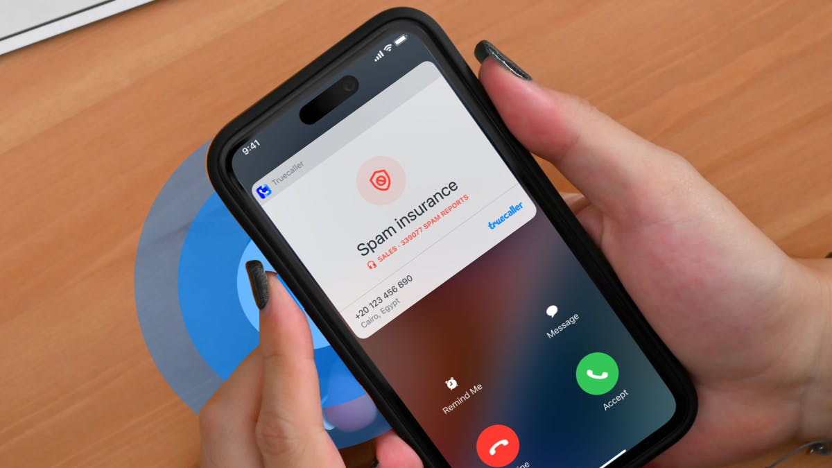 Person clicking the action button in an iPhone